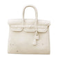 Image showcasing the exquisite marble detailing of The Princess by Currey and Company, available at ChicHomeVibes.com. This close-up view reveals the variations in color and intricate details of the white marble used to sculpt this replica Hermes Birkin Bag. The rich textures and luxurious finish emphasize the craftsmanship, making this marble sculpture a magnificent tribute to the iconic Hermes Birkin, ideal for discerning home decor enthusiasts.