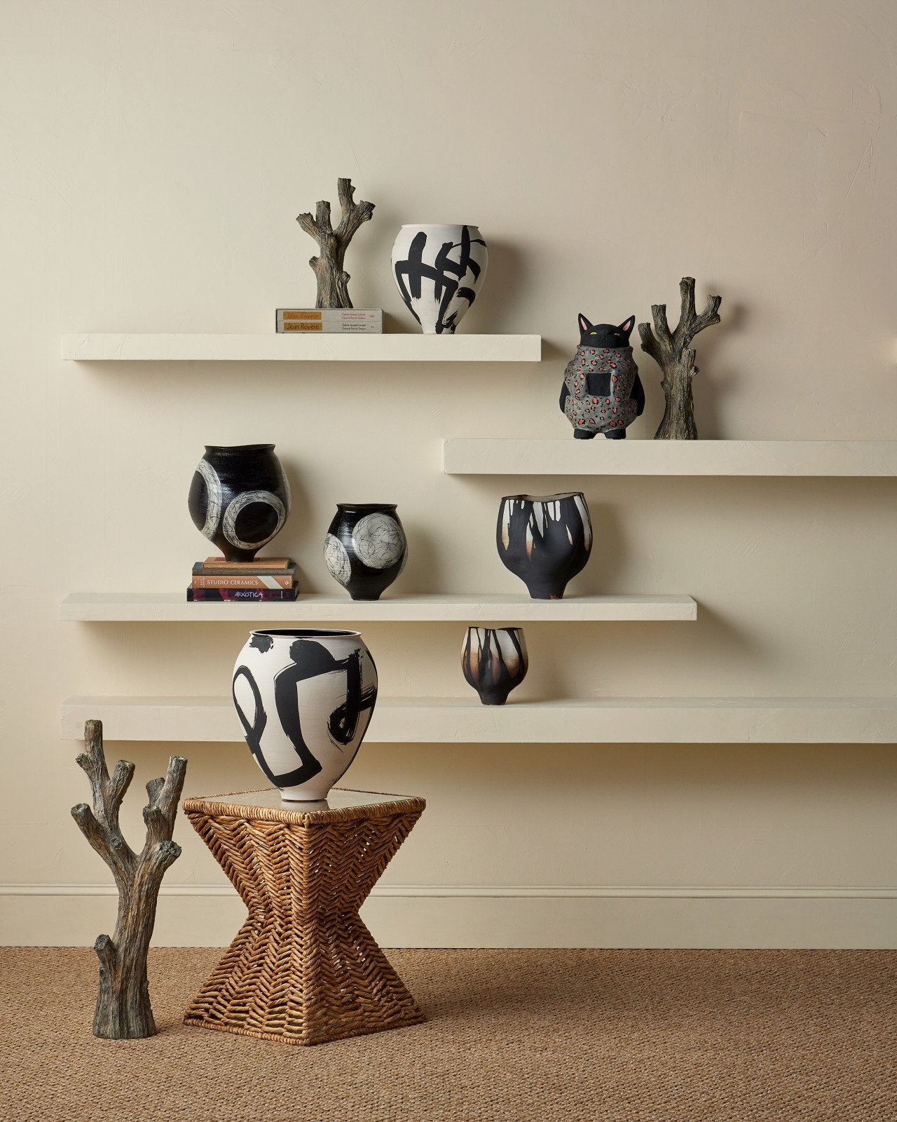 Lifestyle image of Satori vase and other vase by Currey and Company