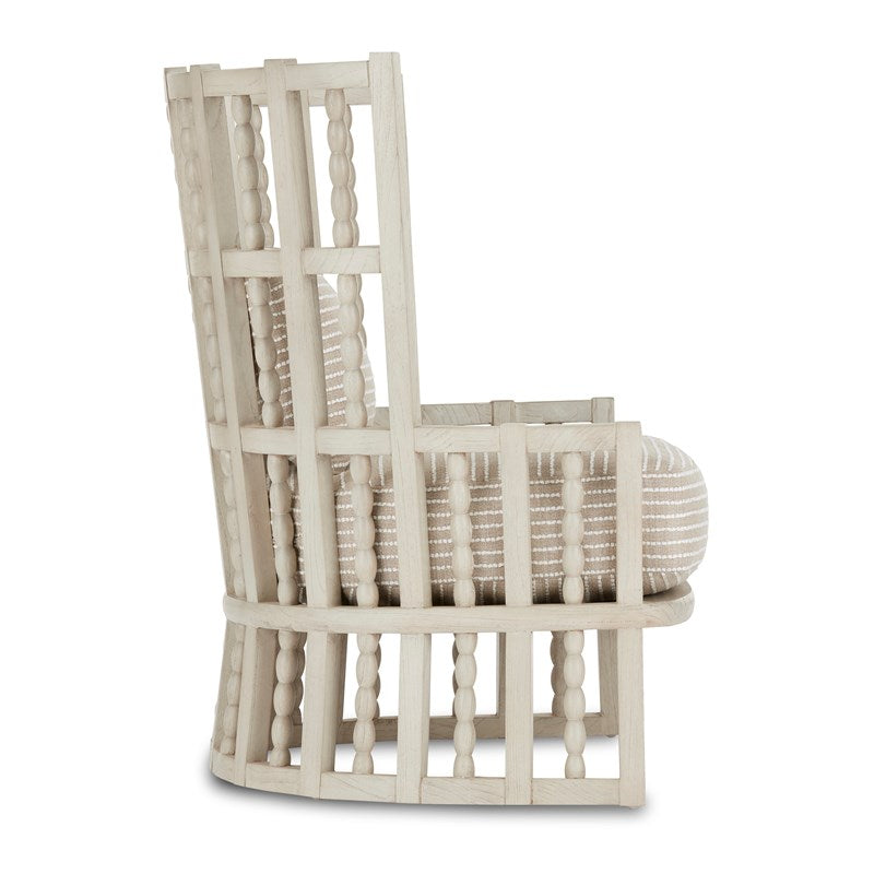 Side view Image of Currey & Company Norene Collection Wing Chair in Fog Gray Finish, made of Mindi Wood, Fabric and Foam with Overall Dimensions of 39.6"h x 35.2"w x 28.8"d and weighing 45lbs