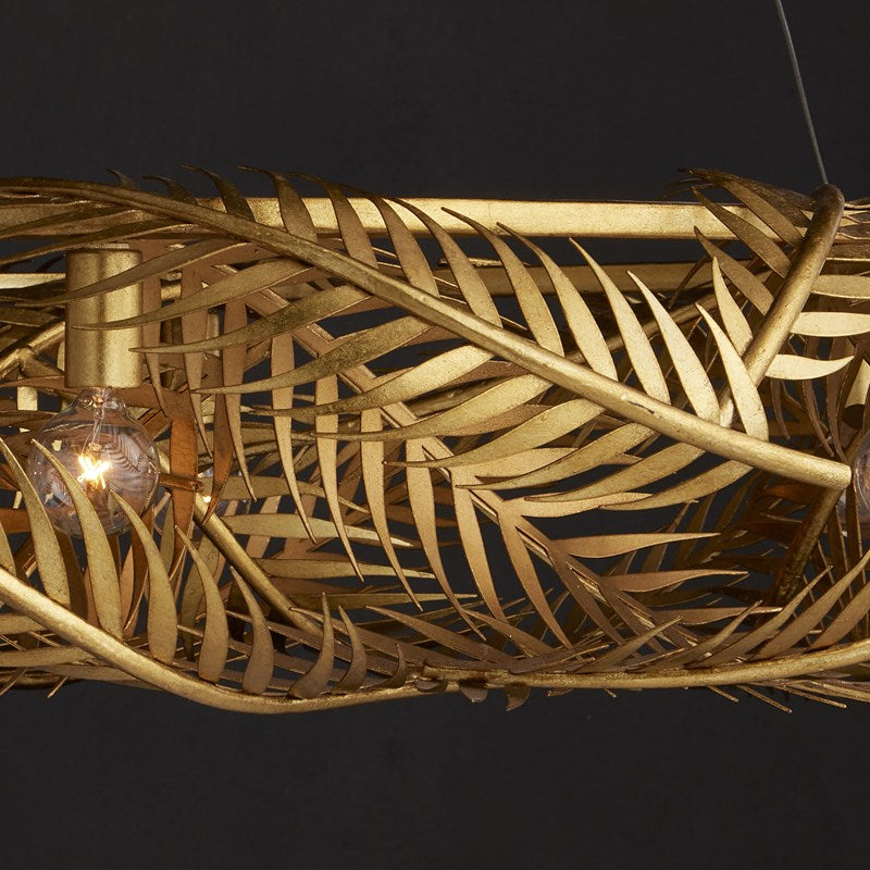 A close up of An image of the Queenbee palm Ring Chandelier in gold made of wrought iron.